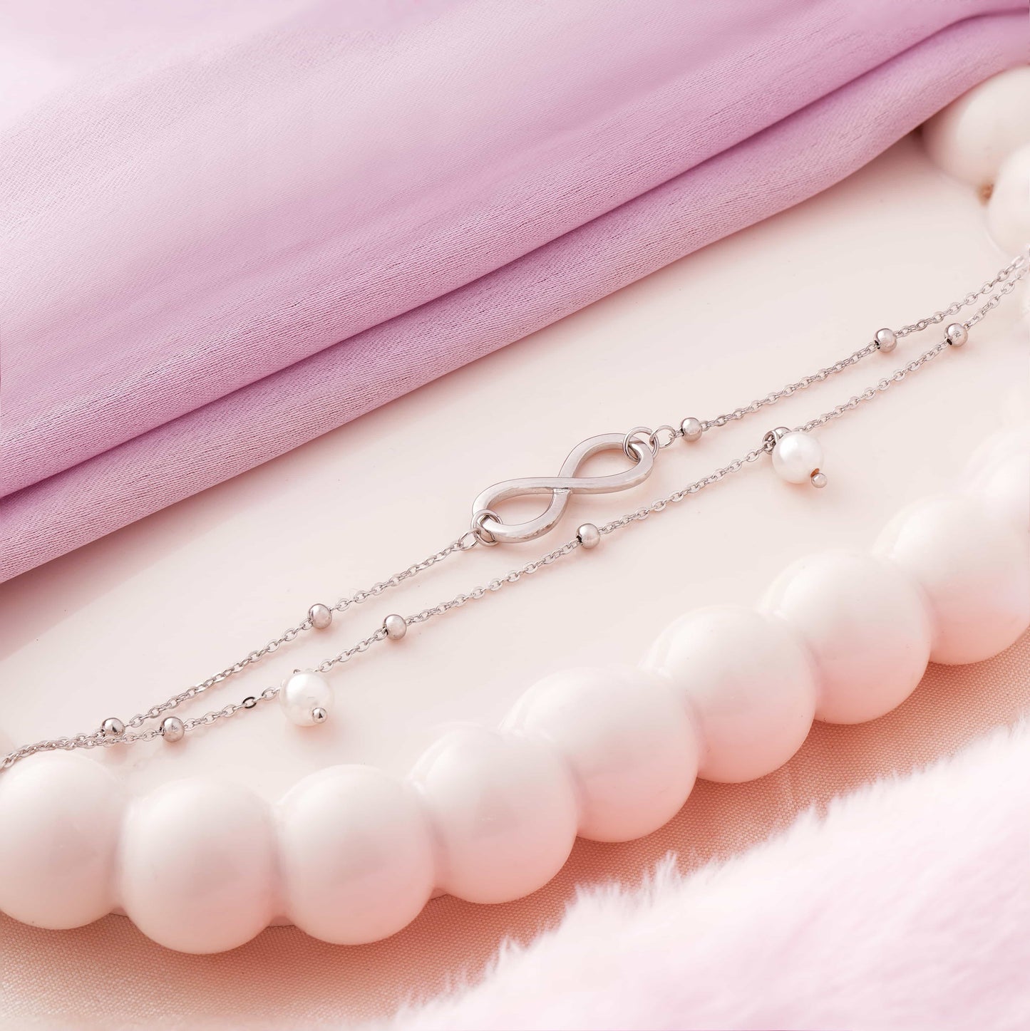 Infinity Pearl Rhodium Bracelet